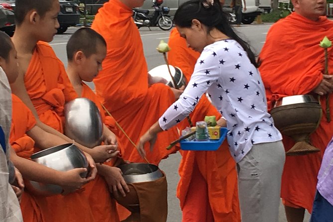 4 highlights: Sticky Waterfall/Elephants/local market /Wat Banden - Alms-giving and temple time: what to expect from the early routine