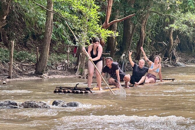 Chiang Mai 1 Day: Elephant Sanctuary, Waterfall & Bamboo Rafting - Karen Hill Tribe greeting: clothing, fruit bags, and real guidance