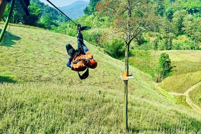 Chiang Mai 3 in 1 Zipline, Elephants and Sticky Waterfall - Ethical elephant sanctuary: feeding, stories, and river bathing
