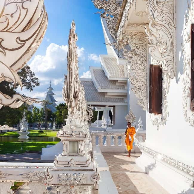 Chiang Mai: Chiang Rai Famous Temples & Hot Springs Day Trip - Wat Rong Khun (White Temple): surreal details with real wandering time