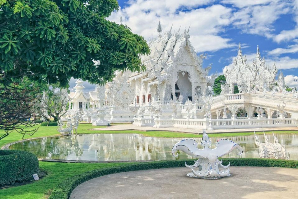 Chiang Mai: Long Neck Village & Chiang Rai’s Iconic Temples - Wat Rong Khun (White Temple): Chalermchai Kositpipat’s Surreal Symbolism