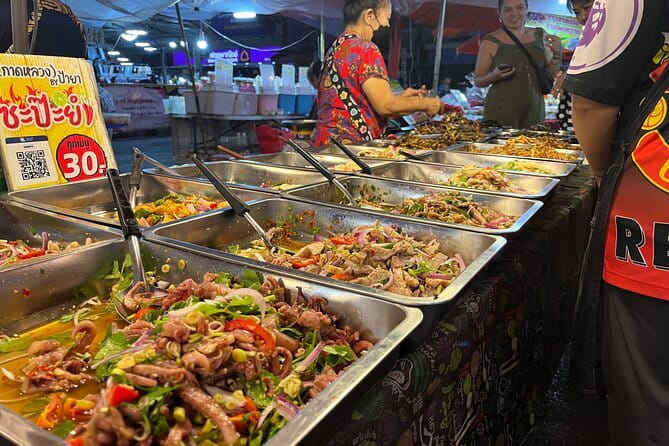 Chiang Mai Temples and Market Tuk Tuk Night Tour - Stop 2 and 3: Wat Phan Tao and Wat Chedi Luang’s Great Stupa ruins