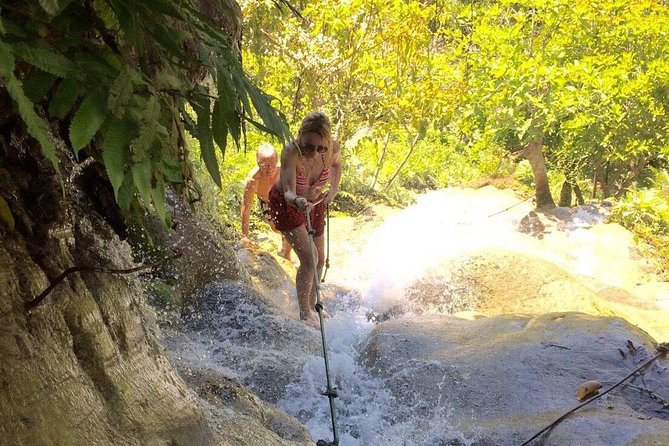 Climb Sticky Waterfall Like a Spiderman - The Bua Thong Waterfalls stop: climbing, cooling off, and staying safe
