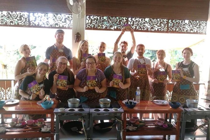 Cooking Morning Class Chiang Mai Visit Organic Garden and Market - The local market stop: fruit, herbs, and pantry basics with a guide