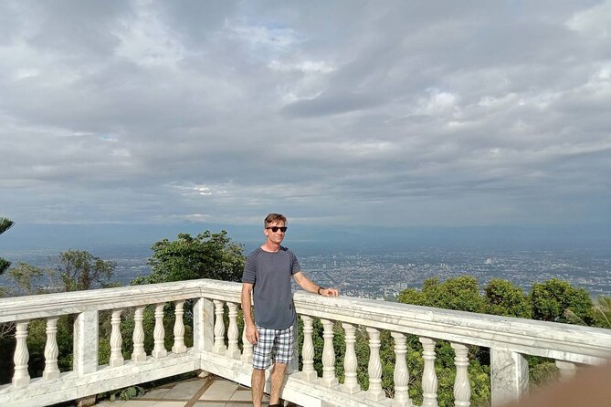 Doi Suthep Temple Tour by Local Red Car 3 Hour Adventure - Getting up the mountain: stairs, Naga serpents, and first impressions