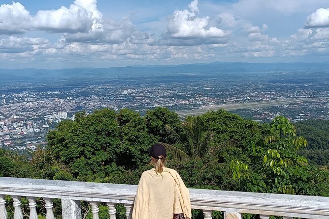 Doi Suthep Temple Tour by Local Red Car 3 Hour Adventure - Inside the temple grounds: listen for the stories